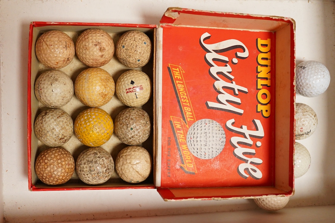 A box of vintage golf balls to include Dunlop